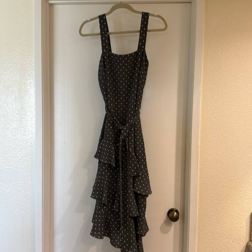 Dress with asymmetrical hem.